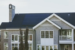 home with installed solar panel